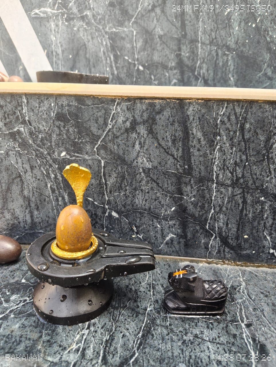 2 Inch Narmadeshwar Shivling with Nandi — Golden Ochre Narmada Stone