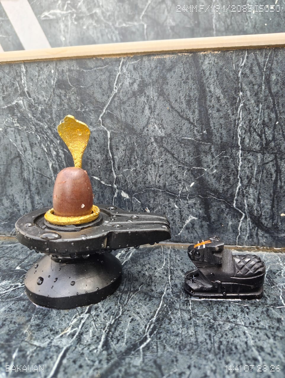 2 Inch Narmadeshwar Shivling with Nandi — Mottled Red-Brown Narmada Stone